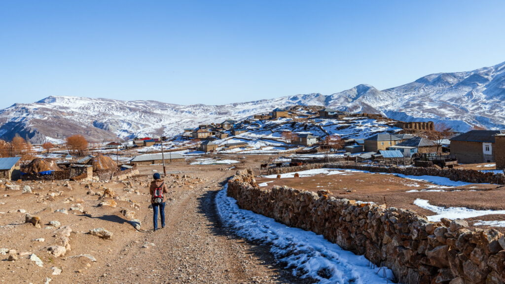tourist-on-a-dirt-road-in-gryz-village-azerbaijan-2025-03-11-13-07-01-utc